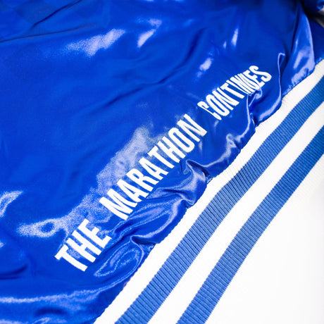 NIPSEY HUSSLE BOOGIE VARSITY JACKET IN BLUE - Allstarelite.com